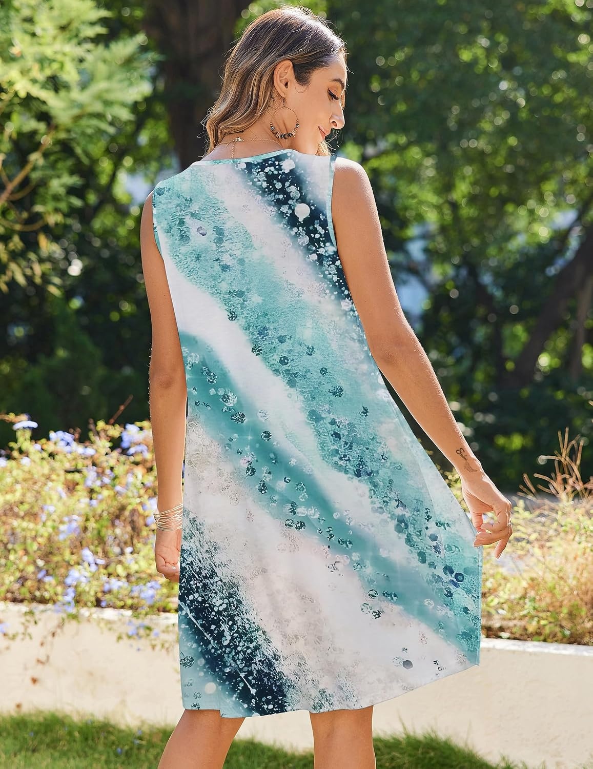 image:imageZeagoo Womens Casual Summer Dresses 2025 Boho Sleeveless Sundresses with Pockets Pleated Beach Floral T Shirt DressesBlueprinted