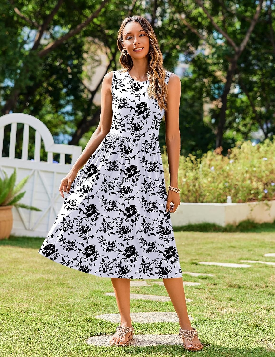 image:imageZeagoo Womens Summer Tank Midi Dress with Pockets Floral Sleeveless ALine Casual Loose TShirt Dresses Beach Sundress 2026Black White Floral