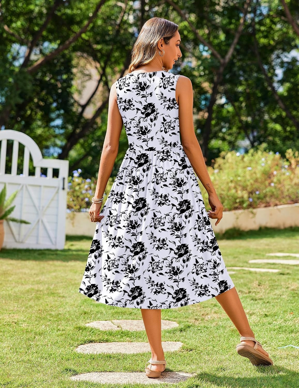 image:imageZeagoo Womens Summer Tank Midi Dress with Pockets Floral Sleeveless ALine Casual Loose TShirt Dresses Beach Sundress 2026Black White Floral