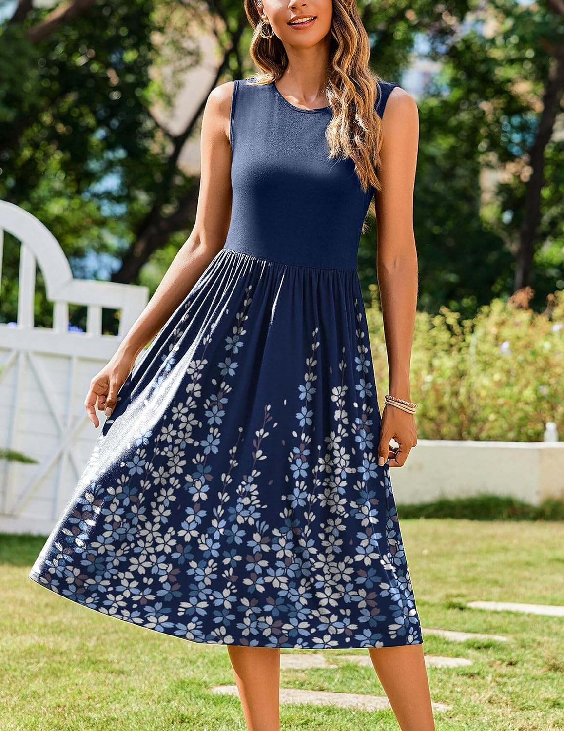image:imageZeagoo Womens Summer Tank Midi Dress with Pockets Floral Sleeveless ALine Casual Loose TShirt Dresses Beach Sundress 2026Navy Blue Floral