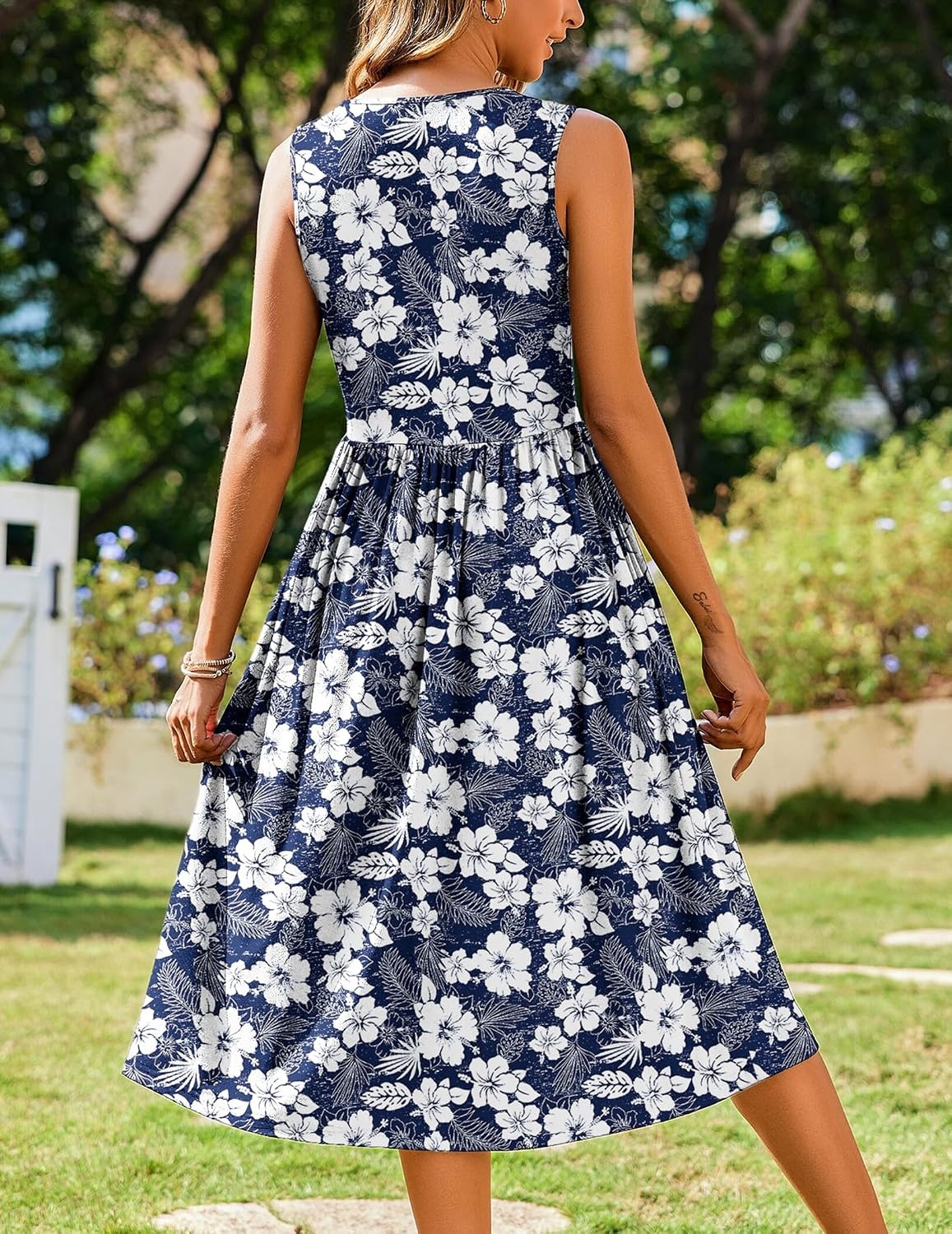 image:imageZeagoo Womens Summer Tank Midi Dress with Pockets Floral Sleeveless ALine Casual Loose TShirt Dresses Beach Sundress 2026Navy White Floral