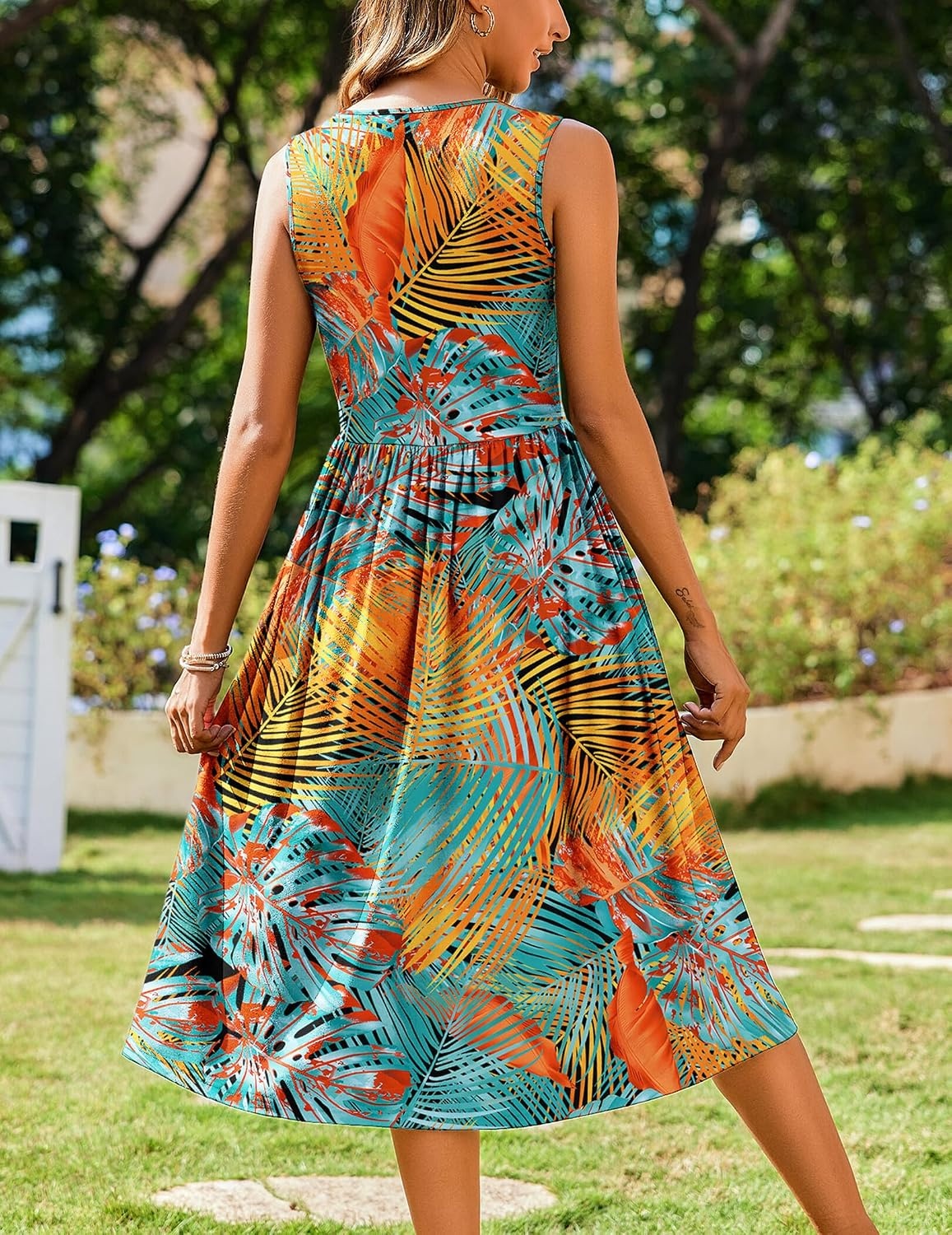 image:imageZeagoo Womens Summer Tank Midi Dress with Pockets Floral Sleeveless ALine Casual Loose TShirt Dresses Beach Sundress 2026Orange Green Leaf