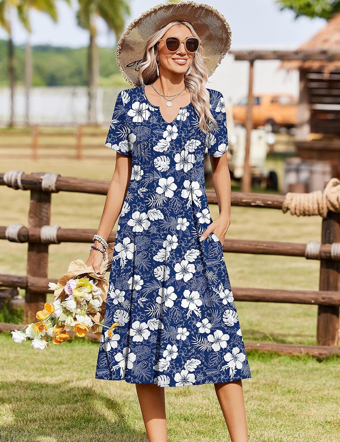 image:imageZeagoo Summer Dresses for Women 2026 Casual Short Sleeve Aline Midi Dress with Pocket Flowy Pleated Tshirt Beach SundressNavy Floral