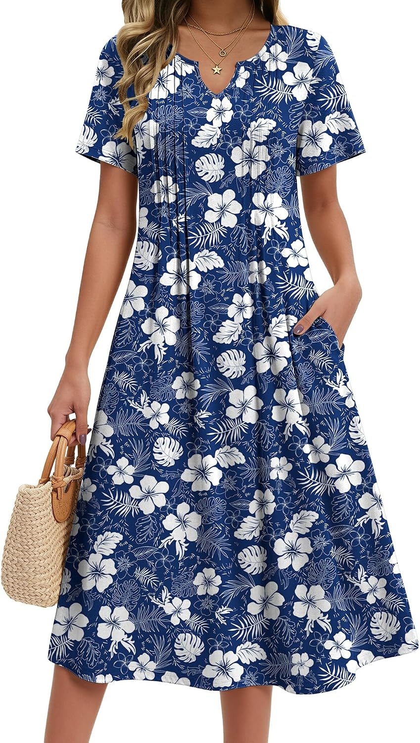 image:imageZeagoo Summer Dresses for Women 2026 Casual Short Sleeve Aline Midi Dress with Pocket Flowy Pleated Tshirt Beach SundressNavy Floral