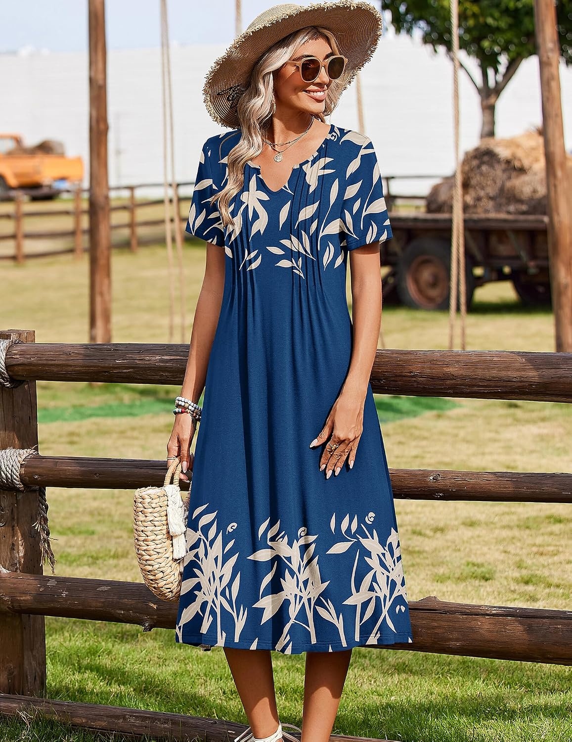 image:imageZeagoo Summer Dresses for Women 2026 Casual Short Sleeve Aline Midi Dress with Pocket Flowy Pleated Tshirt Beach SundressNavy Leaf Print