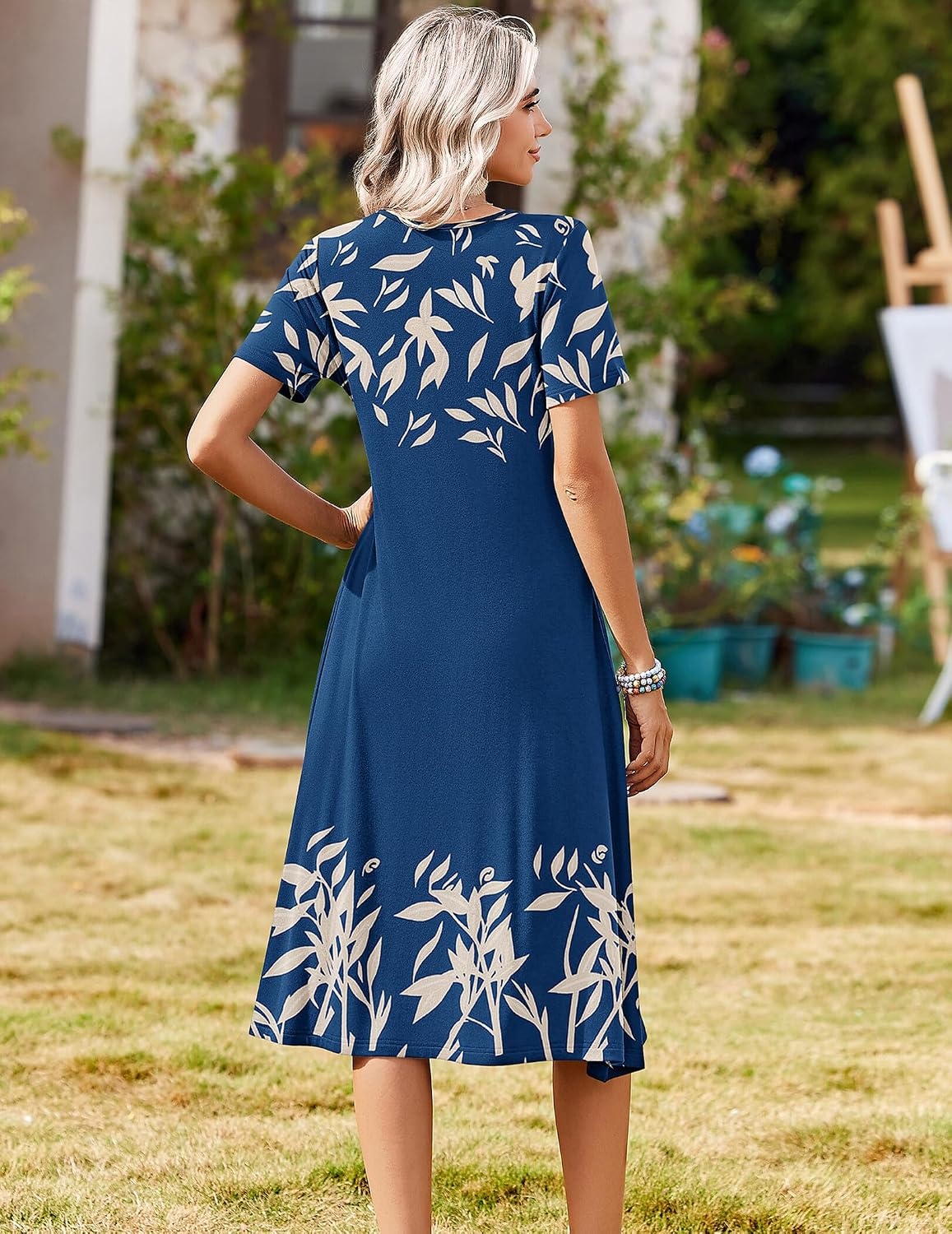 image:imageZeagoo Summer Dresses for Women 2026 Casual Short Sleeve Aline Midi Dress with Pocket Flowy Pleated Tshirt Beach SundressNavy Leaf Print
