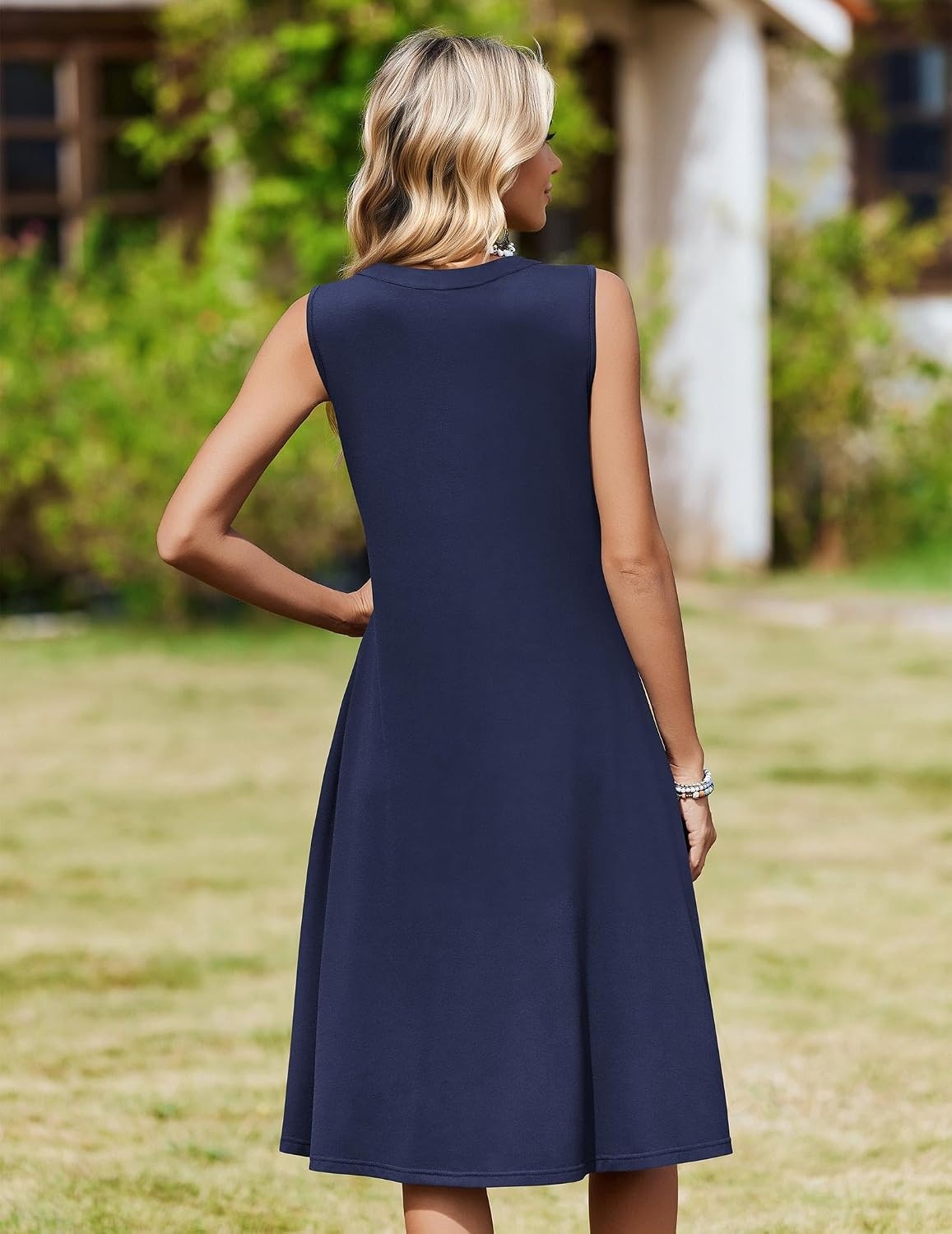 image:imageZeagoo Women Summer Casual Dress 2026 Sleeveless Midi Tank Sundress with Pockets V Neck Buttons Pleated A Line Tshirt DressNavy Blue