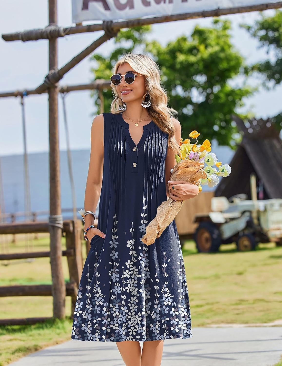 image:imageZeagoo Women Summer Casual Dress 2026 Sleeveless Midi Tank Sundress with Pockets V Neck Buttons Pleated A Line Tshirt DressNavy Blue Floral