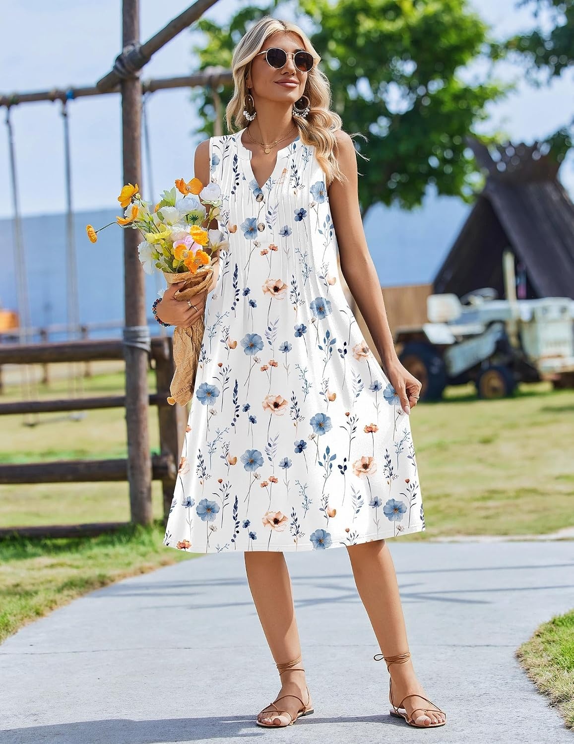 image:imageZeagoo Women Summer Casual Dress 2026 Sleeveless Midi Tank Sundress with Pockets V Neck Buttons Pleated A Line Tshirt DressWhite Floral